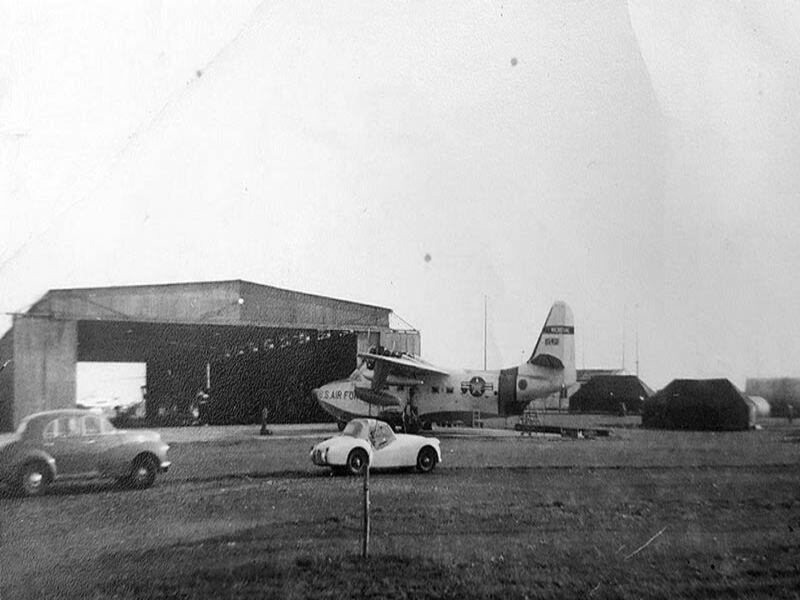 photo of US seaplane outside a hangar